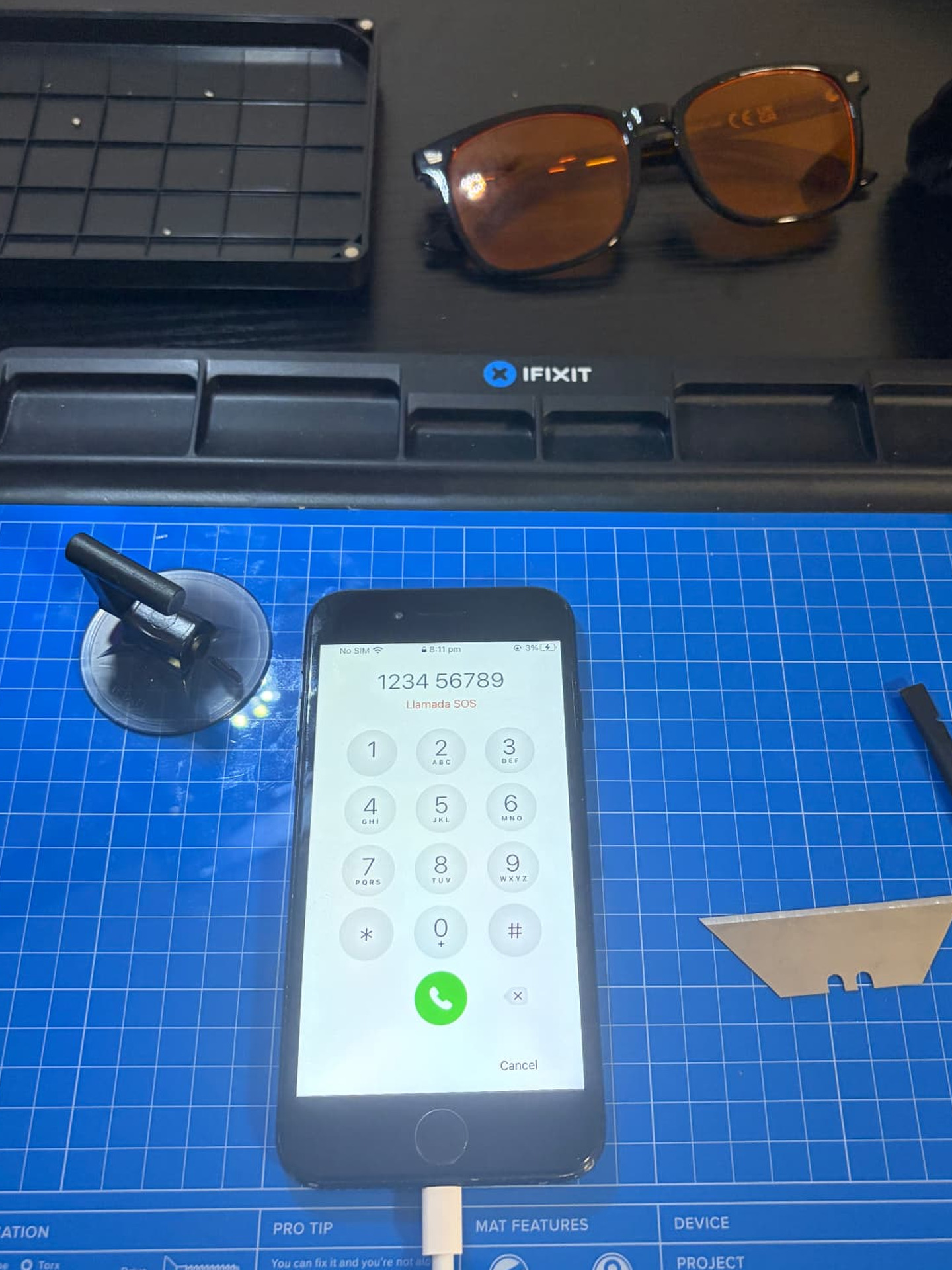 The same smartphone with a clean, undamaged screen after repair